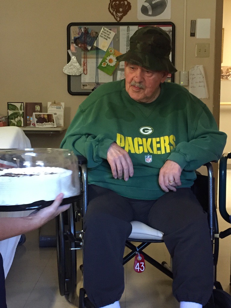 BD. Dads checking out his cake